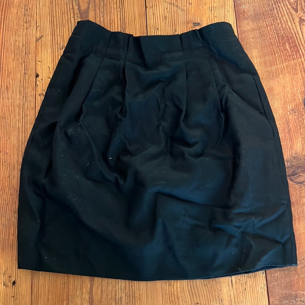 Pleated wool mini skirt